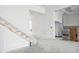 A modern entryway with wainscoting, leading to the rest of the unfinished home at 1217 Bentcreek Ln., Myrtle Beach, SC 29579