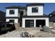 Exterior of a two story home featuring a two-car garage and modern design, shown mid-construction at 1217 Bentcreek Ln., Myrtle Beach, SC 29579