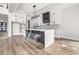Modern kitchen featuring a center island, white cabinets, and stainless steel appliances, great for cooking and entertaining at 1217 Bentcreek Ln., Myrtle Beach, SC 29579