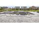 View of an unfinished pool with gray stone pavers being installed at 1217 Bentcreek Ln., Myrtle Beach, SC 29579