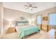Comfortable bedroom featuring a ceiling fan, complemented by soft lighting and a cozy atmosphere at 1221 Tidewater Dr. # 1721, North Myrtle Beach, SC 29582