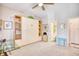Bedroom with built-in shelves, great natural light and an ensuite bathroom at 1221 Tidewater Dr. # 1721, North Myrtle Beach, SC 29582