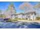 Well-maintained two-story building with convenient parking and landscaped surroundings, offering a welcoming atmosphere at 1221 Tidewater Dr. # 1721, North Myrtle Beach, SC 29582