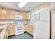 Kitchen featuring laminate counters, and white appliances at 1221 Tidewater Dr. # 1721, North Myrtle Beach, SC 29582
