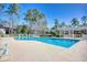 Community pool with ample lounge seating, perfect for relaxation and socializing on sunny days at 1221 Tidewater Dr. # 1721, North Myrtle Beach, SC 29582