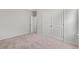 Bedroom with closet, neutral walls, carpet, and door to the bathroom at 1227 Cypress Shoal Dr., Conway, SC 29526