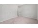 Spacious bedroom features a double door closet, neutral walls, and plush carpeting at 1227 Cypress Shoal Dr., Conway, SC 29526