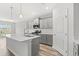 Stylish kitchen with stainless appliances, quartz countertops, and a modern kitchen island at 1227 Cypress Shoal Dr., Conway, SC 29526