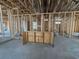 Internal framing with an incomplete wall and a concrete foundation visible at 1229 Lady Bird Way, North Myrtle Beach, SC 29582
