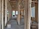 Spacious room shows the wooden framing, concrete floor and exterior view at 1229 Lady Bird Way, North Myrtle Beach, SC 29582
