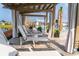 Tranquil poolside with lounge chairs, palm trees, and a view of the lake at 1229 Lady Bird Way, North Myrtle Beach, SC 29582