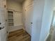 Mudroom with built-in storage and wood look flooring at 1249 Crested Iris Way, North Myrtle Beach, SC 29582