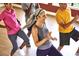 Active group fitness class in a well-lit studio, promoting a healthy lifestyle at 1249 Crested Iris Way, North Myrtle Beach, SC 29582