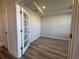 Office space featuring wood-look flooring and glass doors at 1249 Crested Iris Way, North Myrtle Beach, SC 29582