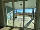 View of a patio with a screened in porch at 1249 Crested Iris Way, North Myrtle Beach, SC 29582