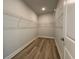 Clean walk-in closet with wired racks for organization at 1249 Crested Iris Way, North Myrtle Beach, SC 29582