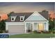 Charming single-Gathering home with a manicured lawn and an attached two-car garage at 1257 Crested Iris Way, North Myrtle Beach, SC 29582
