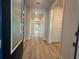 Inviting foyer with light wood floors that leads into the home's bright and spacious interior at 1257 Crested Iris Way, North Myrtle Beach, SC 29582