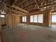 Interior framing showcasing windows in a new home with concrete flooring at 1257 Crested Iris Way, North Myrtle Beach, SC 29582