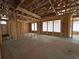 Interior framing of new home with visible window placements and concrete floor at 1257 Crested Iris Way, North Myrtle Beach, SC 29582