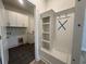 Mudroom with utility sink and custom built-in storage at 1257 Crested Iris Way, North Myrtle Beach, SC 29582