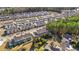 Expansive aerial view of a residential neighborhood with lush green trees at 1298 Harvester Circle # 1298, Myrtle Beach, SC 29579