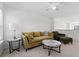 Inviting living room with ceiling fan, sofa, accent chair, and modern coffee table at 1298 Harvester Circle # 1298, Myrtle Beach, SC 29579