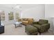 Living room featuring natural light, plush seating, and stylish marble coffee table at 1298 Harvester Circle # 1298, Myrtle Beach, SC 29579