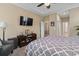 Bedroom featuring a TV, a display cabinet, and neutral decor at 14 Cobblestone Dr., Pawleys Island, SC 29585