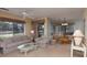 Bright and airy living room with comfortable seating, a ceiling fan and natural light at 141 Hartland Dr. # 5-C, Myrtle Beach, SC 29572