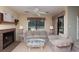 Inviting living room features a fireplace, neutral furniture, and a window view at 141 Hartland Dr. # 5-C, Myrtle Beach, SC 29572