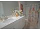 Bathroom featuring a white vanity and a shower with a decorative shower curtain at 148 Splendor Circle, Murrells Inlet, SC 29576
