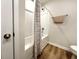 Bathroom features a shower-tub combo with a decorative shower curtain and chrome fixtures at 157 B Villa Grande St. # B, Myrtle Beach, SC 29579