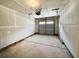 Garage features concrete flooring, unfinished drywall, and a garage door at 157 B Villa Grande St. # B, Myrtle Beach, SC 29579