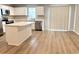 Stylish kitchen with a central island, stainless steel appliances, and white cabinets at 157 B Villa Grande St. # B, Myrtle Beach, SC 29579
