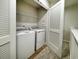 Laundry room offers a washer and dryer with a shelf at 157 B Villa Grande St. # B, Myrtle Beach, SC 29579
