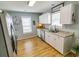 Bright kitchen with white cabinets and stainless steel appliances at 217 Sienna Dr., Little River, SC 29566