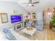 Bright living room with vaulted ceiling and an open layout leading to the front door at 217 Sienna Dr., Little River, SC 29566