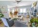 Open-concept living area with sliding glass doors, wood floors, and views into the dining area at 217 Sienna Dr., Little River, SC 29566