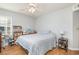 Comfortable bedroom with laminate flooring and plenty of natural light from a window with blinds at 2258 Huntingdon Dr. # B, Myrtle Beach, SC 29575