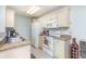 Efficient kitchen with ample counter space, a tiled backsplash, and a full appliance suite at 2258 Huntingdon Dr. # B, Myrtle Beach, SC 29575