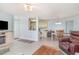 Open living and dining area with easy access to the kitchen and tiled floors for simple maintenance at 2258 Huntingdon Dr. # B, Myrtle Beach, SC 29575