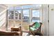 Relaxing sunroom with wicker furniture and views of the water at 2258 Huntingdon Dr. # B, Myrtle Beach, SC 29575
