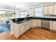 Lovely kitchen featuring granite countertops, stainless steel appliances, and hardwood floors at 225-B Dogwood Dr. N, Murrells Inlet, SC 29576