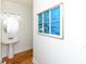 Modern powder room featuring a stylish pedestal sink and artwork, a functional space at 225-B Dogwood Dr. N, Murrells Inlet, SC 29576