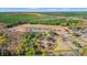 Beautiful aerial perspective showcasing the community's ponds, landscaping, and residential development at 227 Six Mile Creek Dr., Georgetown, SC 29440