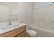 Bathroom featuring a shower and tub, along with a modern vanity and natural light at 227 Six Mile Creek Dr., Georgetown, SC 29440