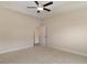 Spacious bedroom featuring neutral carpet, ample natural light, and convenient access to an attached bathroom at 227 Six Mile Creek Dr., Georgetown, SC 29440