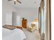 Bright bedroom featuring neutral walls, ceiling fan, decorative chair and dresser at 2418 Goldfinch Dr., Myrtle Beach, SC 29577