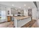 Well-lit kitchen with stainless steel appliances, a granite countertop island, and modern cabinetry at 2418 Goldfinch Dr., Myrtle Beach, SC 29577